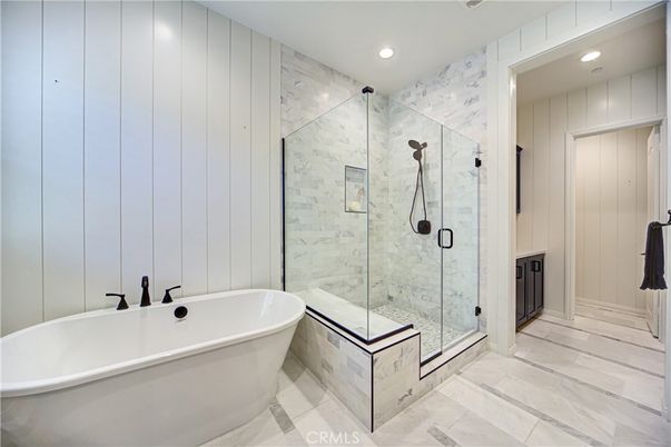 Bathroom, Free Standing Baths, Glass Shower, Interior, Marble Walls, Recessed Lighting
