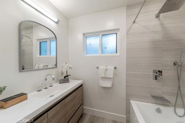 Bathroom, Dual Sink Vanities, Glass Shower, Interior, Wood Texture Flooring