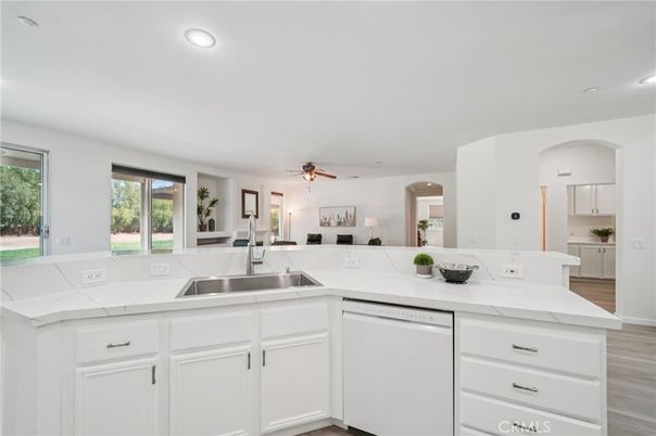 Interior, Kitchen, Recessed Lighting, Tile Countertops, Wood Texture Flooring