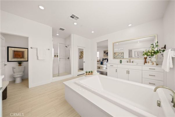Bathroom, Bedroom, Dual Sink Vanities, Glass Shower, Interior, Recessed Lighting, Wood Texture Flooring