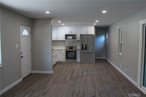 Interior, Kitchen, Recessed Lighting, Stainless Steel Appliances, Wood Texture Flooring