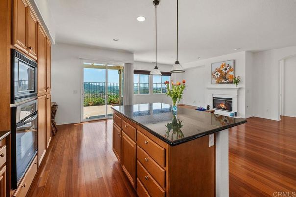 Fireplace, Interior, Kitchen, Pendant Lights, Recessed Lighting, Wood Texture Flooring