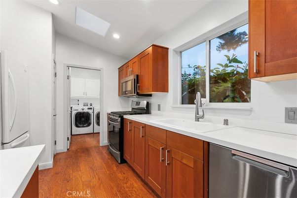 Interior, Kitchen, Recessed Lighting, Stainless Steel Appliances, Washer, Wood Texture Flooring