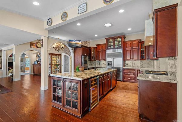 Chandelier, Interior, Kitchen, Recessed Lighting, Stainless Steel Appliances, Wood Texture Flooring