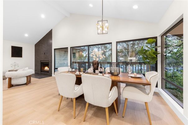 Dining room, Fireplace, Interior, Pendant Lights, Recessed Lighting, Wood Texture Flooring