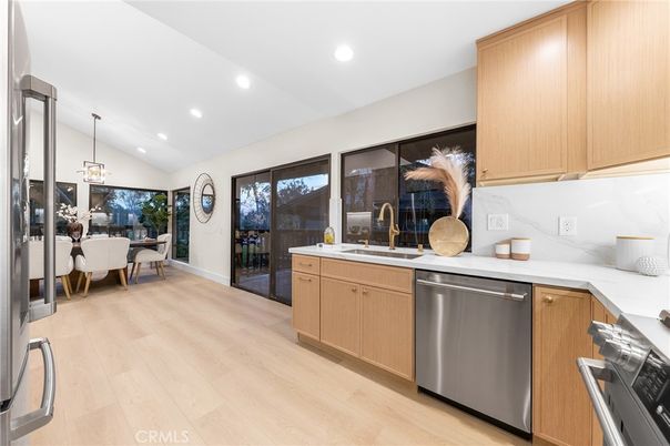 Dining room, Interior, Kitchen, Pendant Lights, Recessed Lighting, Stainless Steel Appliances, Wood Texture Flooring