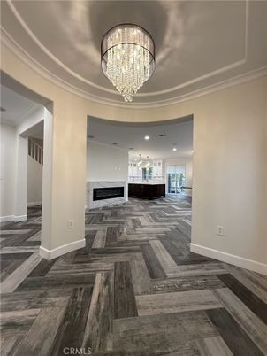 Chandelier, Fireplace, Interior, Recessed Lighting, Wood Texture Flooring