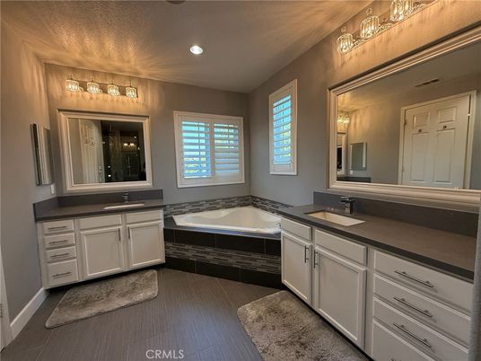 Bathroom, Dual Sink Vanities, Interior, Recessed Lighting, Wood Texture Flooring