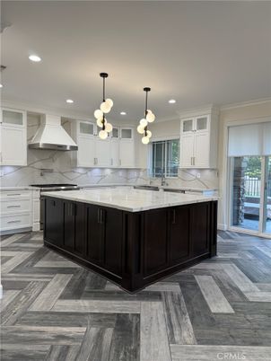 Interior, Kitchen, Marble Walls, Pendant Lights, Recessed Lighting, Wood Texture Flooring