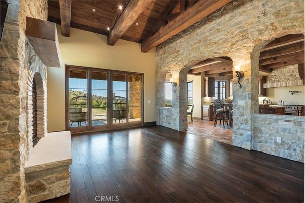 Empty room, Fireplace, Interior, Kitchen, Recessed Lighting, Stone Walls, Wooden Beams, Wooden Ceilings, Wood Texture Flooring