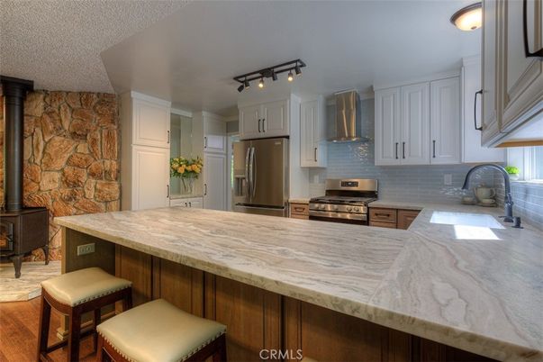 Interior, Kitchen, Stainless Steel Appliances, Stone Walls, Wood Texture Flooring