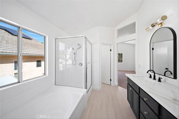 Bathroom, Dual Sink Vanities, Glass Shower, Interior, Wood Texture Flooring