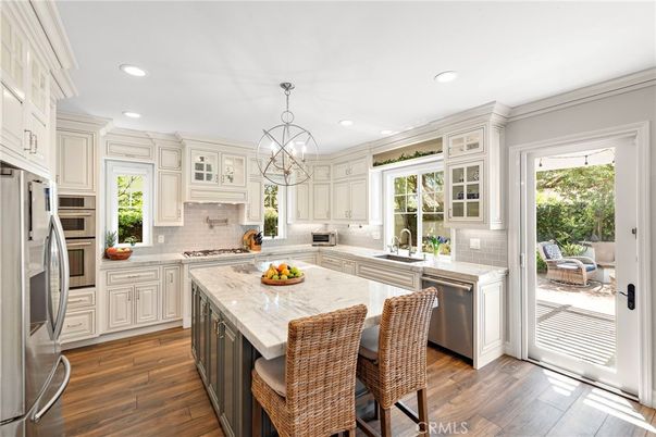 Chandelier, Interior, Kitchen, Pendant Lights, Recessed Lighting, Stainless Steel Appliances, Wood Texture Flooring