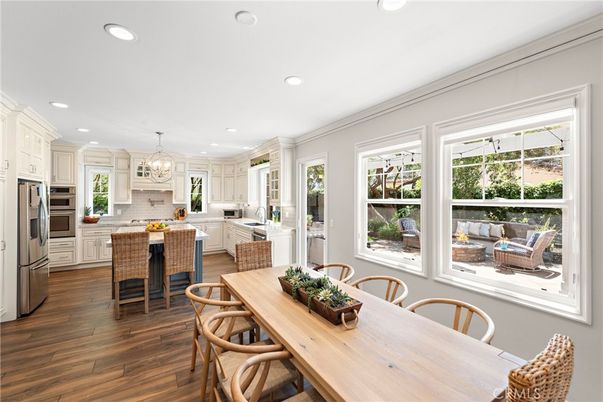Chandelier, Dining room, Interior, Kitchen, Recessed Lighting, Stainless Steel Appliances, Wood Texture Flooring