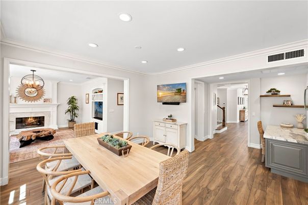 Dining room, Fireplace, Interior, Living room, Recessed Lighting, Wood Texture Flooring