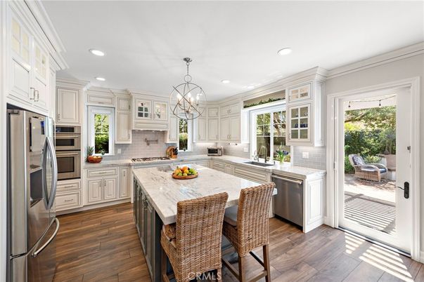 Chandelier, Interior, Kitchen, Recessed Lighting, Stainless Steel Appliances, Wood Texture Flooring