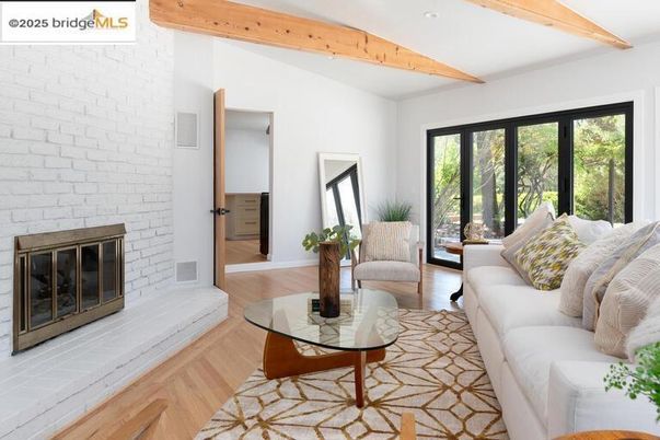 Fireplace, Interior, Living room, Recessed Lighting, Stone Walls, Wooden Beams, Wood Texture Flooring