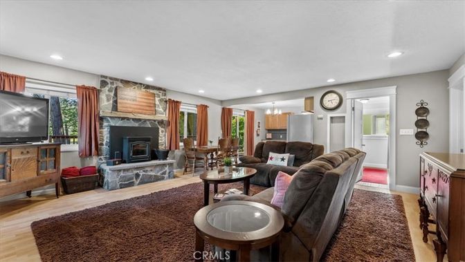Chandelier, Dining room, Fireplace, Interior, Living room, Recessed Lighting, Wood Texture Flooring