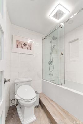 Bathroom, Glass Shower, Interior, Marble Walls, Wood Texture Flooring