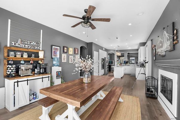 Dining room, Fireplace, Interior, Kitchen, Recessed Lighting, Wood Texture Flooring