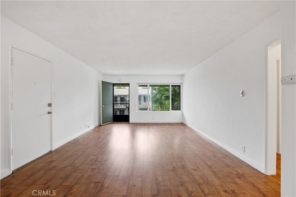 Empty room, Interior, Kitchen, Stainless Steel Appliances, Wood Texture Flooring