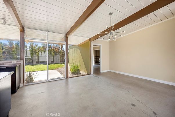 Empty room, Fireplace, Interior, Pendant Lights, Sun Room, Wooden Beams