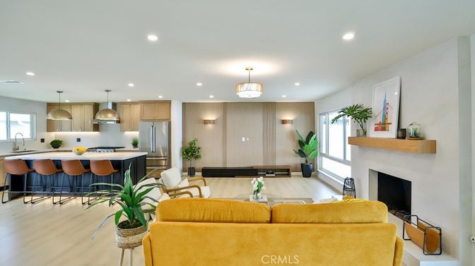 Fireplace, Interior, Kitchen, Living room, Pendant Lights, Recessed Lighting, Stainless Steel Appliances, Wood Texture Flooring