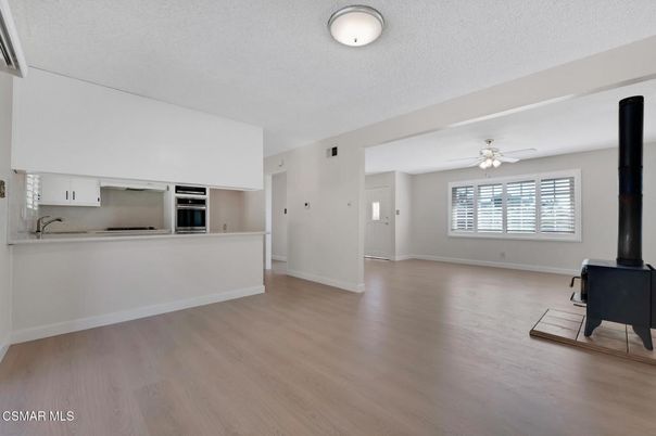 Empty room, Interior, Kitchen, Stainless Steel Appliances, Wood Texture Flooring