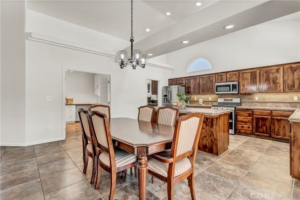 Chandelier, Dining room, Interior, Kitchen, Pendant Lights, Recessed Lighting, Stainless Steel Appliances