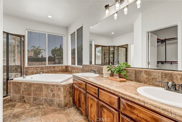 Bathroom, Dual Sink Vanities, Glass Shower, Interior, Recessed Lighting, Tile Countertops
