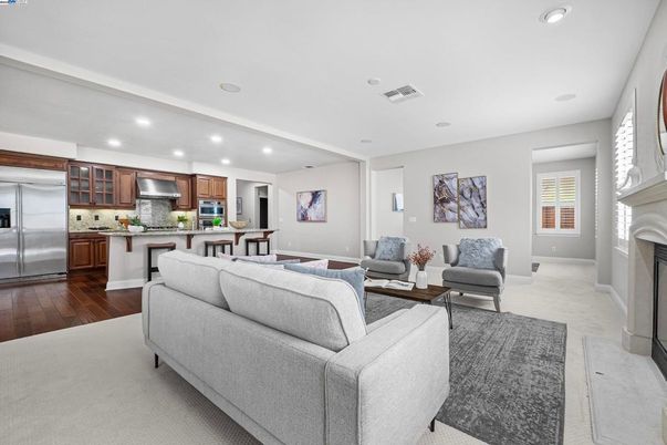 Fireplace, Interior, Kitchen, Living room, Recessed Lighting, Stainless Steel Appliances, Wood Texture Flooring