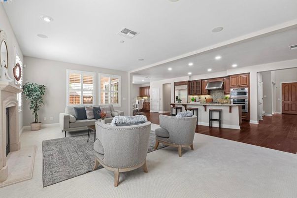Fireplace, Interior, Kitchen, Living room, Recessed Lighting, Stainless Steel Appliances, Wood Texture Flooring