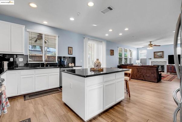 Fireplace, Interior, Kitchen, Living room, Recessed Lighting, Wood Texture Flooring