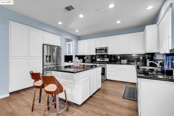 Interior, Kitchen, Recessed Lighting, Stainless Steel Appliances, Wood Texture Flooring
