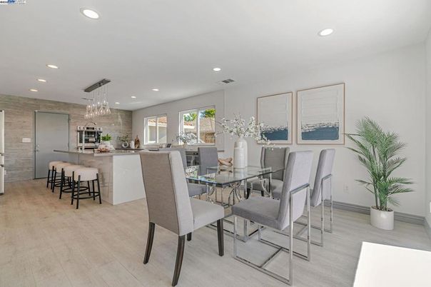 Chandelier, Dining room, Interior, Kitchen, Pendant Lights, Recessed Lighting, Stainless Steel Appliances, Wood Texture Flooring