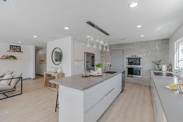 Interior, Kitchen, Pendant Lights, Recessed Lighting, Stainless Steel Appliances, Wood Texture Flooring