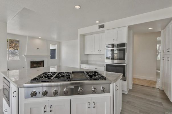 Fireplace, Interior, Kitchen, Recessed Lighting, Wood Texture Flooring