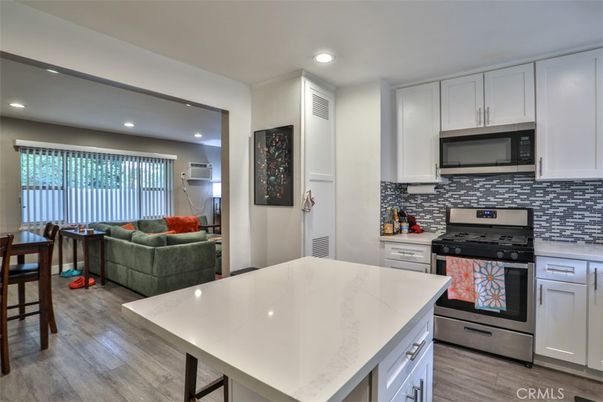 Interior, Kitchen, Living room, Recessed Lighting, Stainless Steel Appliances, Wood Texture Flooring