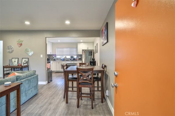 Dining room, Interior, Kitchen, Recessed Lighting, Stainless Steel Appliances, Wood Texture Flooring