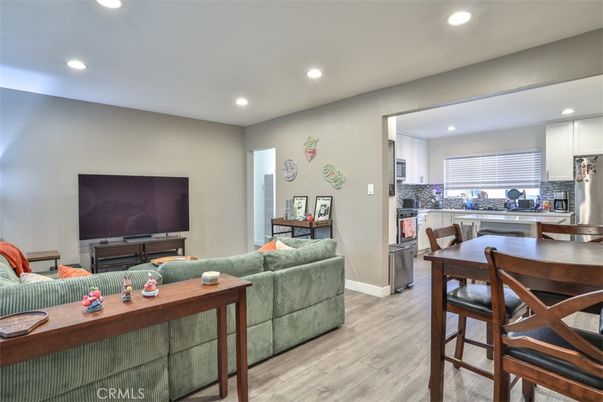 Dining room, Interior, Kitchen, Living room, Recessed Lighting, Stainless Steel Appliances, Wood Texture Flooring