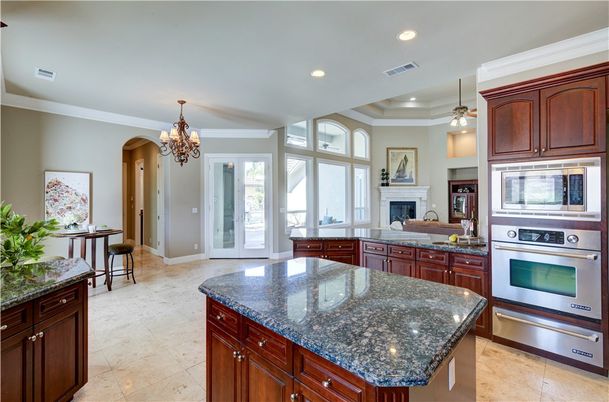 Chandelier, Fireplace, Interior, Kitchen, Recessed Lighting, Stainless Steel Appliances