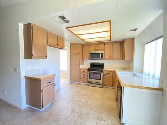 Interior, Kitchen, Stainless Steel Appliances, Tile Countertops