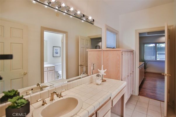 Bathroom, Dual Sink Vanities, Interior, Tile Countertops, Wood Texture Flooring