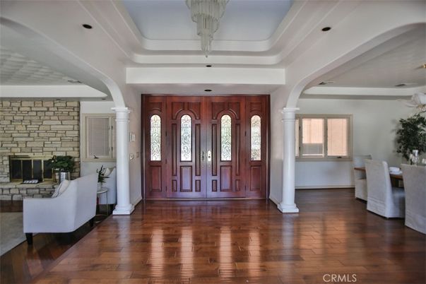 Dining room, Fireplace, Interior, Recessed Lighting, Stone Walls, Wood Texture Flooring