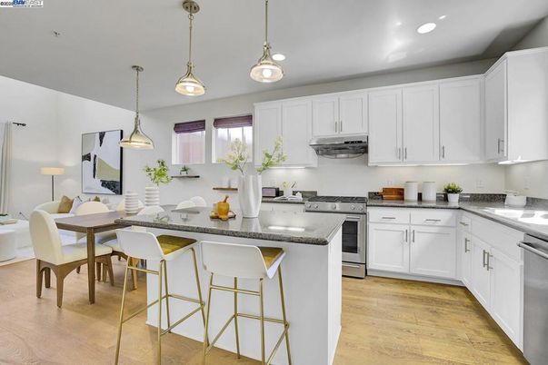 Dining room, Interior, Kitchen, Pendant Lights, Recessed Lighting, Stainless Steel Appliances, Wood Texture Flooring