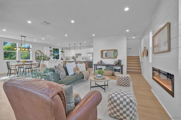 Dining room, Fireplace, Interior, Kitchen, Living room, Pendant Lights, Recessed Lighting, Stainless Steel Appliances, Wood Texture Flooring