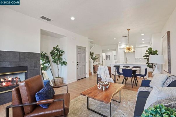 Dining room, Fireplace, Interior, Kitchen, Living room, Pendant Lights, Recessed Lighting, Wood Texture Flooring