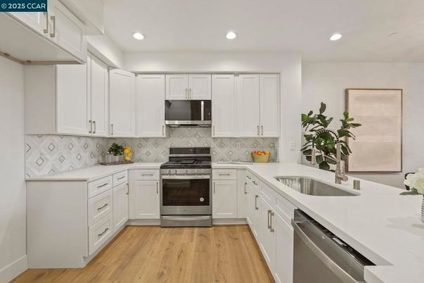 Interior, Kitchen, Recessed Lighting, Stainless Steel Appliances, Wood Texture Flooring