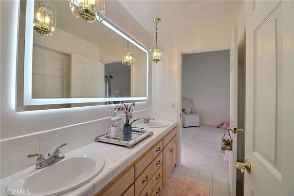 Bathroom, Dual Sink Vanities, Interior, Pendant Lights, Tile Countertops