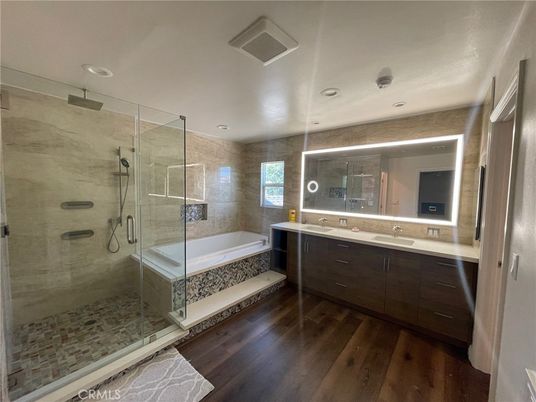 Bathroom, Dual Sink Vanities, Glass Shower, Interior, Recessed Lighting, Wood Texture Flooring